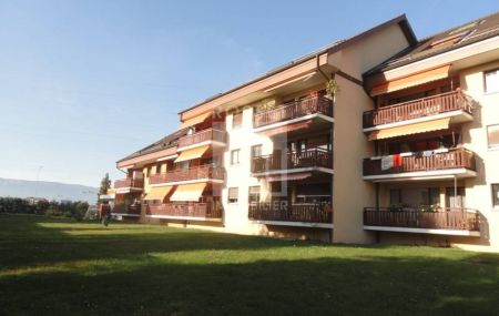 Appartement de 4 pièces au rez-de-chaussée avec balcon