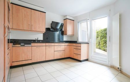 Appartement de 5 pièces en rez de jardin avec sous-sol aménagé