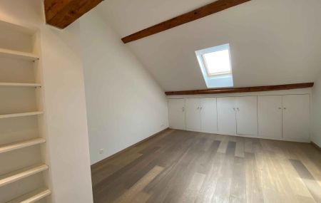 Appartement de 5 pièces en triplex avec cour et jardin à Thônex