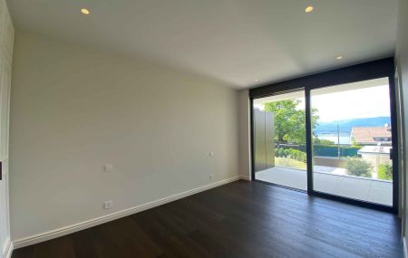 Appartement neuf de 5 pièces en triplex avec jardin et vue lac à Hermance