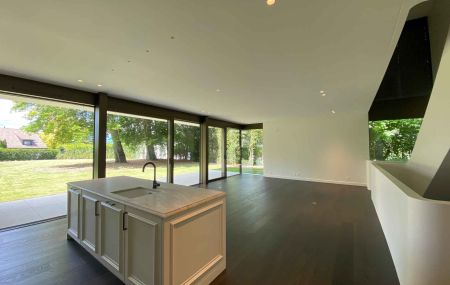 Appartement neuf de 5 pièces en triplex avec jardin et vue lac à Hermance