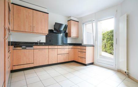 Appartement de 5 pièces en rez de jardin avec sous-sol aménagé