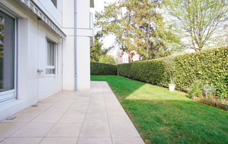Appartement de 5 pièces en rez de jardin avec sous-sol aménagé