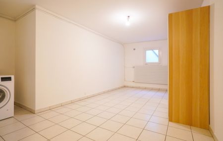 Appartement de 5 pièces en rez de jardin avec sous-sol aménagé