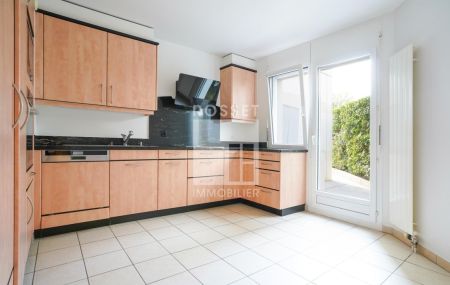 Appartement de 5 pièces en rez de jardin avec sous-sol aménagé