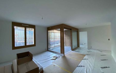 Appartement de 5 pièces avec terrasse/jardin dans immeuble neuf à Bernex
